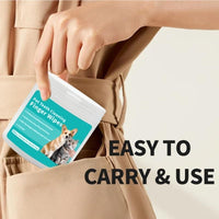 Person holding a package of pet teeth cleaning finger wipes with text 'Easy to carry & use' on beige pants.